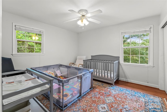 34 Westridge Dr, Asheville, NC 28803 - bedroom with wood finished floors, baseboards, and a ceiling fan