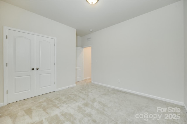 4051 Whittier Ln, Fort Mill, SC 29708 - unfurnished bedroom featuring carpet floors, baseboards, and a closet