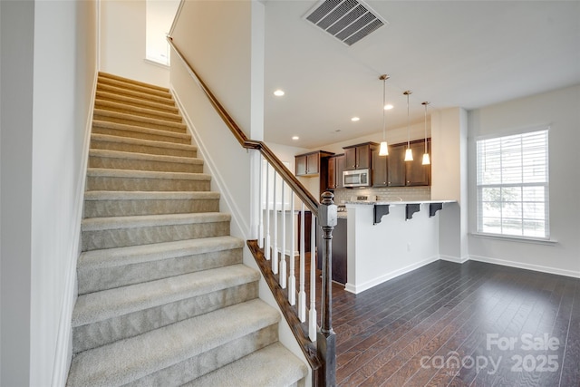 4051 Whittier Ln, Fort Mill, SC 29708 - staircase featuring hardwood / wood-style floors, recessed lighting, and baseboards