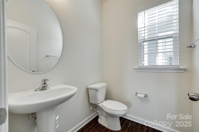 4051 Whittier Ln, Fort Mill, SC 29708 - half bathroom with baseboards, toilet, and wood finished floors