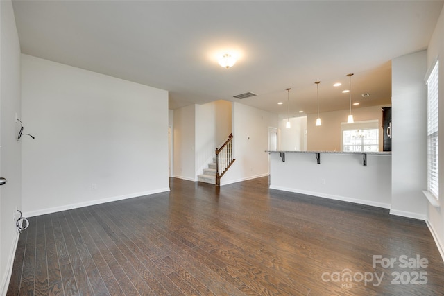 4051 Whittier Ln, Fort Mill, SC 29708 - unfurnished living room featuring dark wood finished floors, stairway, recessed lighting, and baseboards