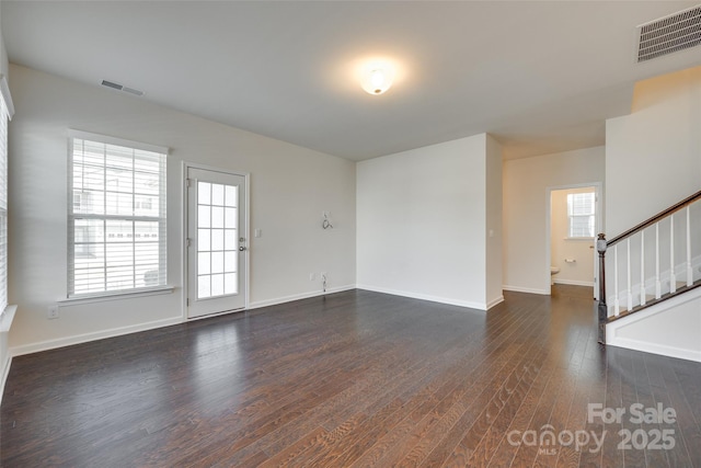 4051 Whittier Ln, Fort Mill, SC 29708 - unfurnished living room featuring stairs, dark wood-type flooring, and baseboards