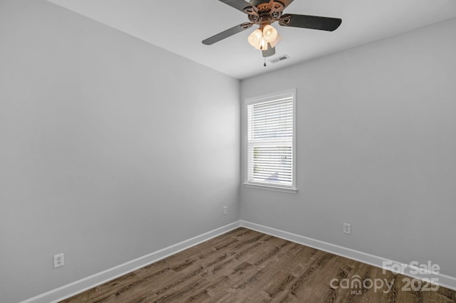 9227 Island Overlook Ct, Cornelius, NC 28031 - spare room with wood finished floors and ceiling fan