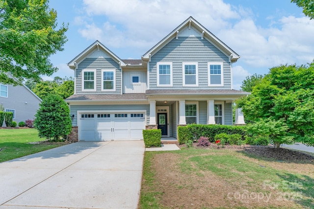 1211 Gold Rush Ct, Fort Mill, SC 29708 - view of front of house with driveway, an attached garage, a front yard, and a porch