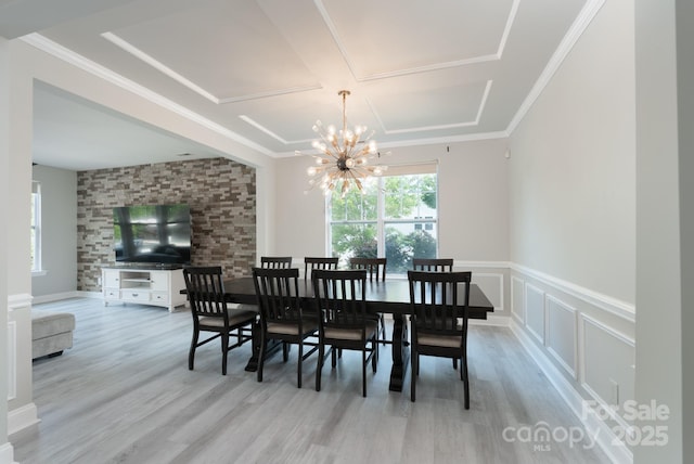 1211 Gold Rush Ct, Fort Mill, SC 29708 - dining room with a chandelier, light wood-style flooring, ornamental molding, and wainscoting