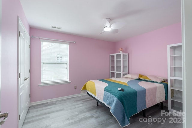 1211 Gold Rush Ct, Fort Mill, SC 29708 - bedroom featuring wood finished floors, ceiling fan, and baseboards