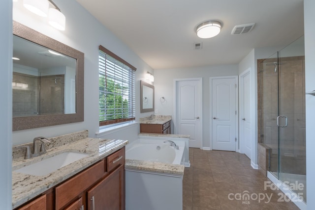 1211 Gold Rush Ct, Fort Mill, SC 29708 - bathroom with a stall shower, two vanities, tile patterned flooring, and a bath