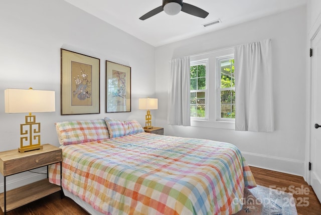 140 Pennsylvania Ave, Asheville, NC 28806 - bedroom with baseboards, wood finished floors, and ceiling fan
