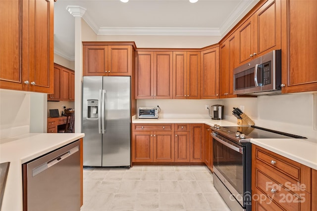 8115 Wilburn Ct, Charlotte, NC 28277 - kitchen featuring appliances with stainless steel finishes, crown molding, brown cabinets, and light countertops