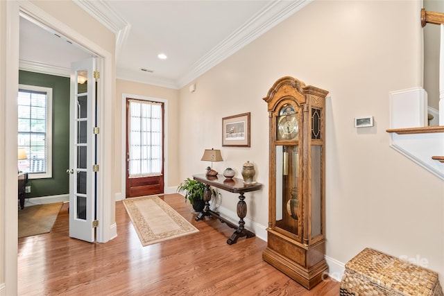 8115 Wilburn Ct, Charlotte, NC 28277 - foyer with wood finished floors, ornamental molding, healthy amount of natural light, baseboards, and recessed lighting
