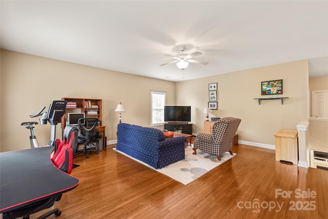 8115 Wilburn Ct, Charlotte, NC 28277 - living room with ceiling fan, wood finished floors, baseboards, and an office area