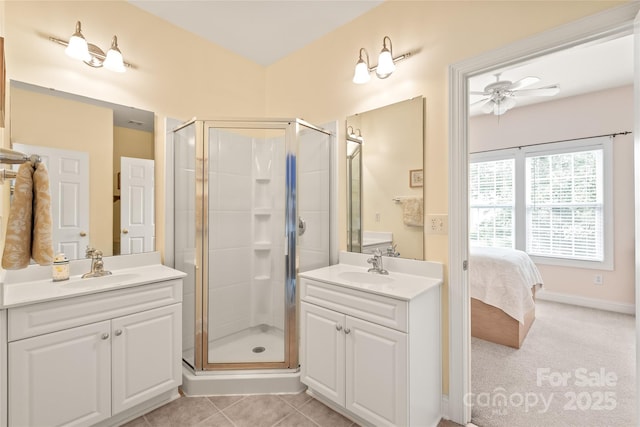8115 Wilburn Ct, Charlotte, NC 28277 - ensuite bathroom featuring ceiling fan, a shower stall, and two vanities