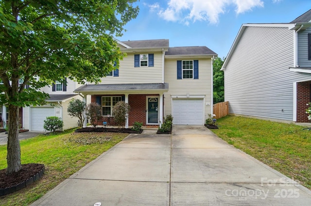 2234 Dion Ave, Charlotte, NC 28212 - view of front of home with driveway, an attached garage, and brick siding
