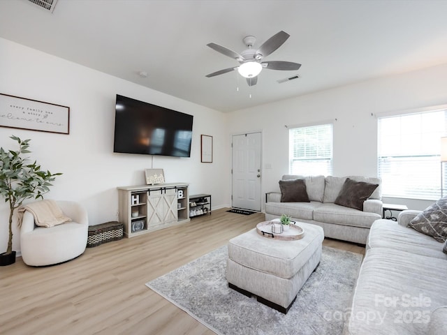 13422 Calloway Glen Dr, Charlotte, NC 28273 - living area featuring wood finished floors and ceiling fan