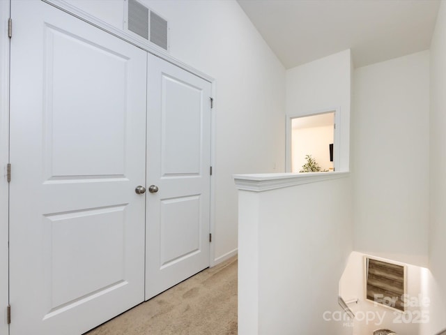 13422 Calloway Glen Dr, Charlotte, NC 28273 - hallway featuring light carpet and baseboards