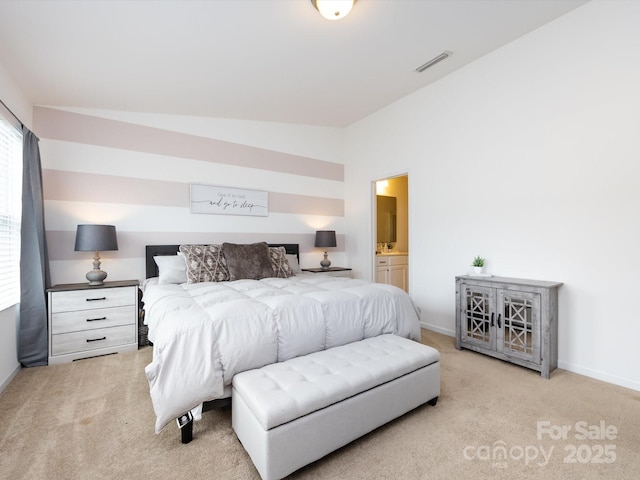 13422 Calloway Glen Dr, Charlotte, NC 28273 - carpeted bedroom with baseboards, lofted ceiling, and connected bathroom