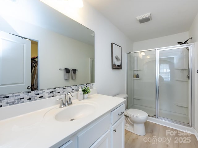 13422 Calloway Glen Dr, Charlotte, NC 28273 - full bath featuring vanity, a stall shower, toilet, and wood finished floors