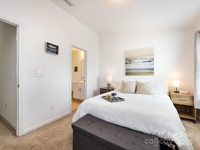 13422 Calloway Glen Dr, Charlotte, NC 28273 - bedroom featuring light colored carpet, baseboards, and connected bathroom