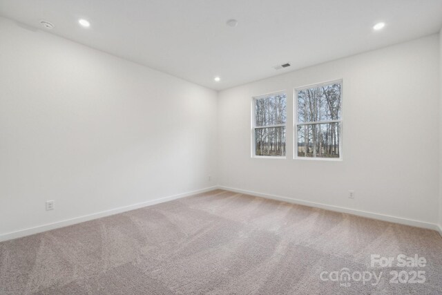 2584 Blue Sky Meadows Dr, Monroe, NC 28110 - unfurnished room featuring light colored carpet and recessed lighting