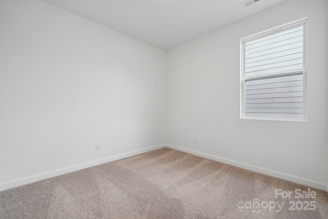 2584 Blue Sky Meadows Dr, Monroe, NC 28110 - spare room featuring carpet and baseboards