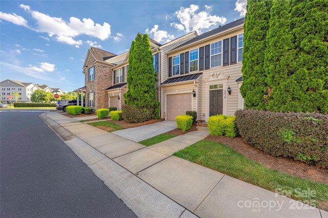 6416 Union Station Ct, Charlotte, NC 28210 - multi unit property featuring driveway, an attached garage, and a residential view