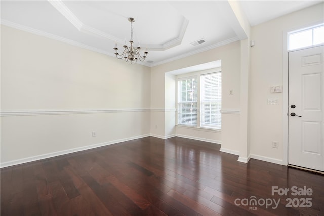 6416 Union Station Ct, Charlotte, NC 28210 - entryway with a chandelier, hardwood / wood-style flooring, ornamental molding, and a raised ceiling