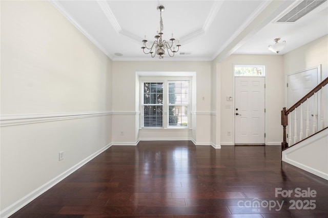 6416 Union Station Ct, Charlotte, NC 28210 - entrance foyer featuring a chandelier, stairs, hardwood / wood-style flooring, a raised ceiling, and crown molding