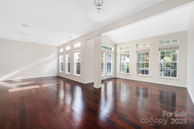 6416 Union Station Ct, Charlotte, NC 28210 - unfurnished living room with lofted ceiling and wood finished floors