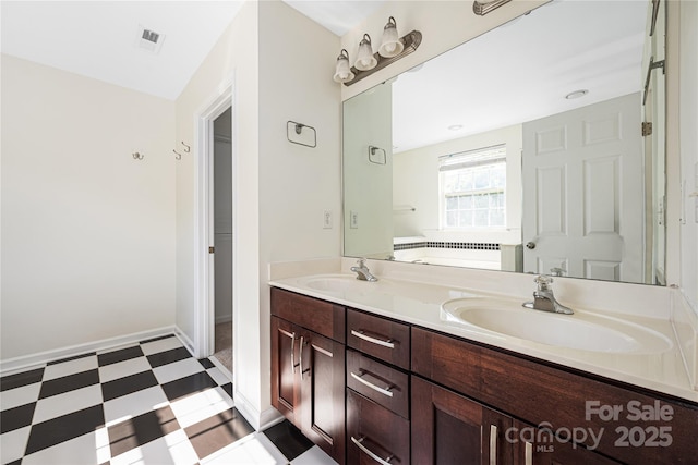 6416 Union Station Ct, Charlotte, NC 28210 - bathroom with double vanity and tile patterned floors