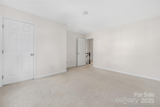 6416 Union Station Ct, Charlotte, NC 28210 - unfurnished bedroom with baseboards and carpet floors