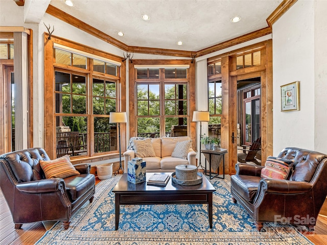 41 Chimney Pt, Lake Toxaway, NC 28747 - living room with ornamental molding, wood finished floors, and recessed lighting