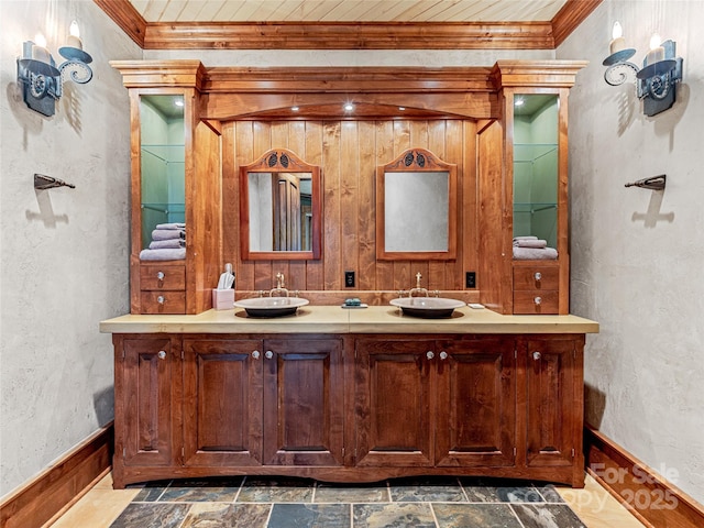 41 Chimney Pt, Lake Toxaway, NC 28747 - bathroom featuring double vanity, crown molding, and baseboards