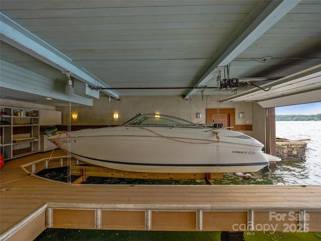 41 Chimney Pt, Lake Toxaway, NC 28747 - exterior space featuring boat lift and a water view
