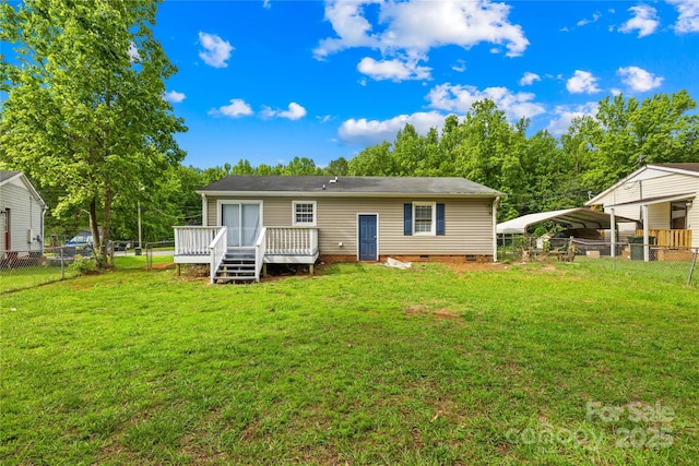 1812 Alpine Dr, Kings Mountain, NC 28086 - rear view of house with a deck, a detached carport, a fenced backyard, and crawl space