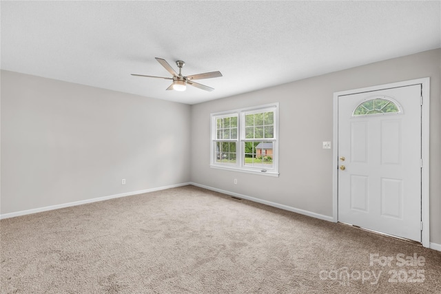 1812 Alpine Dr, Kings Mountain, NC 28086 - carpeted foyer entrance featuring a ceiling fan and a textured ceiling
