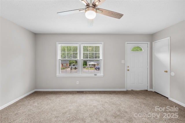 1812 Alpine Dr, Kings Mountain, NC 28086 - carpeted entryway featuring ceiling fan and a textured ceiling