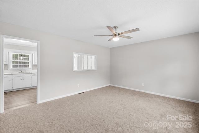 1812 Alpine Dr, Kings Mountain, NC 28086 - empty room featuring light carpet and a ceiling fan