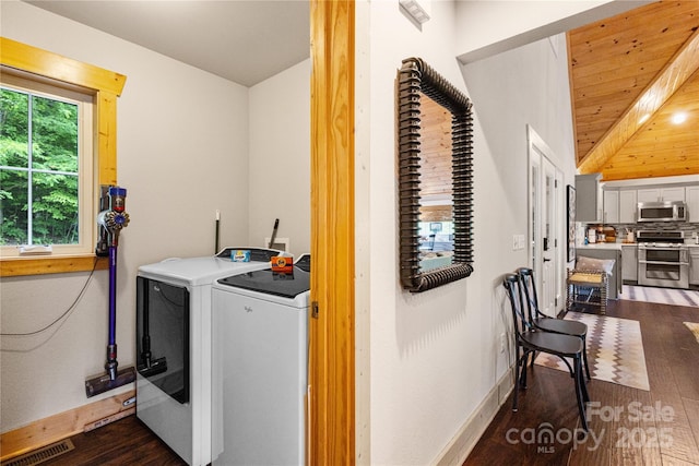 75 Indigo Bunting Ct, Tuckasegee, NC 28783 - washroom with dark wood finished floors, washer and dryer, and wood ceiling