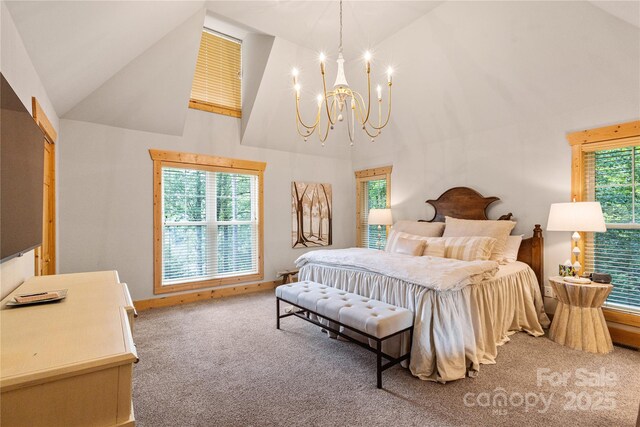 75 Indigo Bunting Ct, Tuckasegee, NC 28783 - bedroom with high vaulted ceiling, carpet flooring, and a chandelier