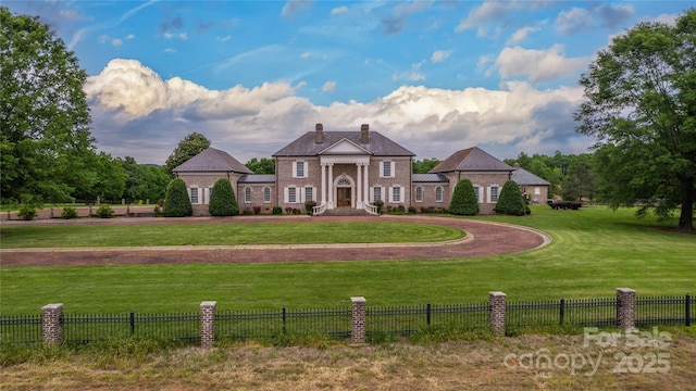 1100 Glen Oaks Dr, Hamptonville, NC 27020 - neoclassical / greek revival house with a chimney and brick siding