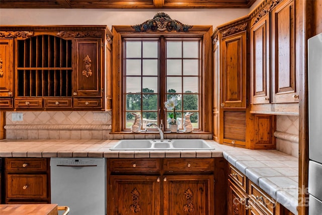 1100 Glen Oaks Dr, Hamptonville, NC 27020 - kitchen with dishwasher, a sink, backsplash, light countertops, and freestanding refrigerator