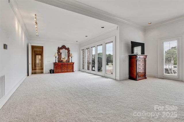 1100 Glen Oaks Dr, Hamptonville, NC 27020 - unfurnished bedroom featuring access to exterior, multiple windows, ornamental molding, carpet flooring, and baseboards