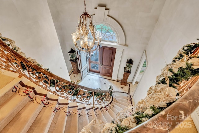 1100 Glen Oaks Dr, Hamptonville, NC 27020 - entryway featuring a high ceiling and a chandelier