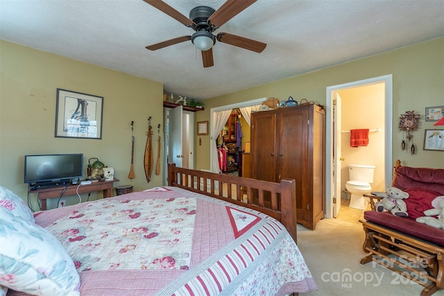 52 Oakhurst Rd, Arden, NC 28704 - carpeted bedroom featuring a ceiling fan and ensuite bathroom