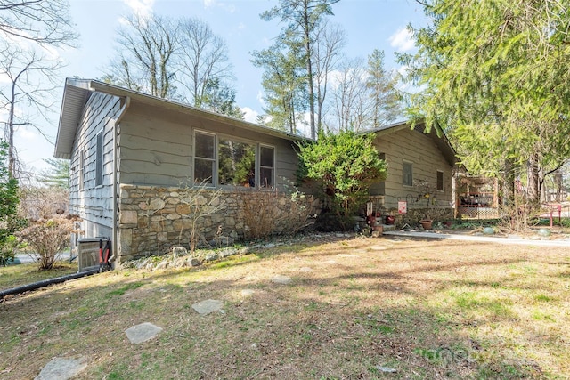 52 Oakhurst Rd, Arden, NC 28704 - view of property exterior with stone siding and a yard