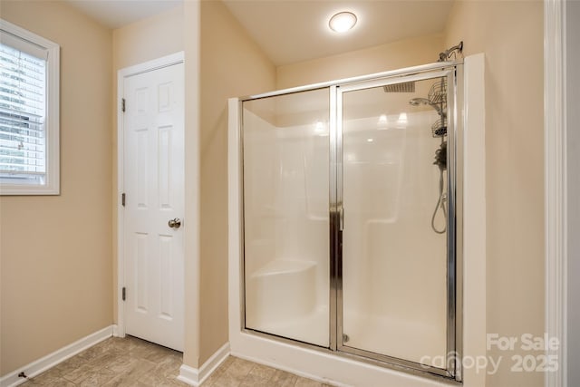 1206 Craig Ave, Lancaster, SC 29720 - bathroom featuring a stall shower and baseboards