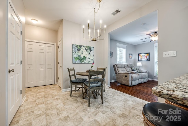 1206 Craig Ave, Lancaster, SC 29720 - dining space with a chandelier and baseboards