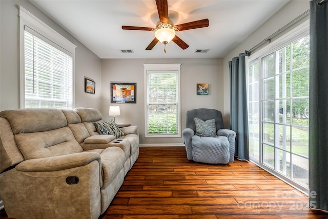 1206 Craig Ave, Lancaster, SC 29720 - living area featuring hardwood / wood-style flooring, a ceiling fan, and baseboards