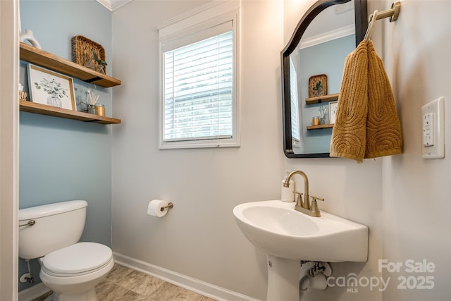 1206 Craig Ave, Lancaster, SC 29720 - bathroom featuring toilet and baseboards