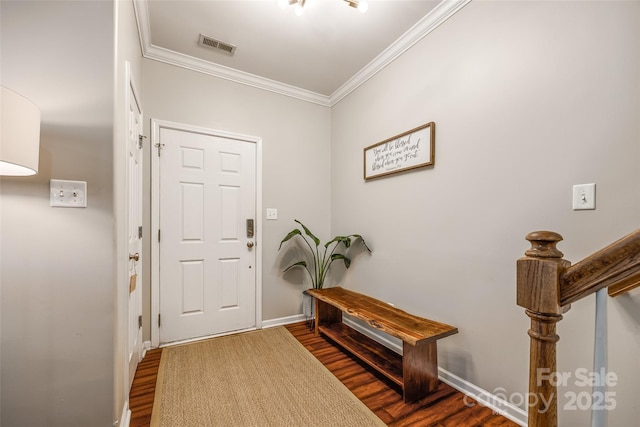 1206 Craig Ave, Lancaster, SC 29720 - foyer entrance with ornamental molding, wood finished floors, and baseboards
